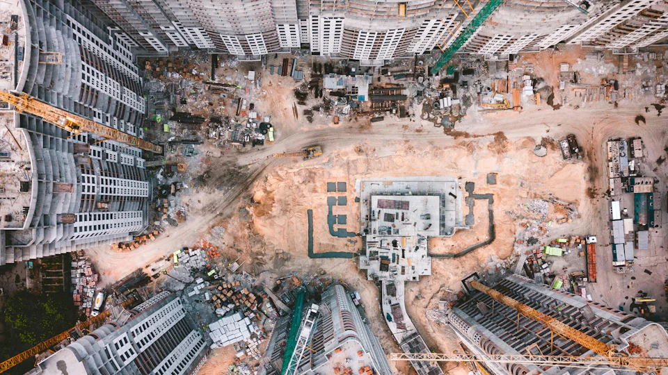 Plots and foundations on a construction site, seen from directly overhead